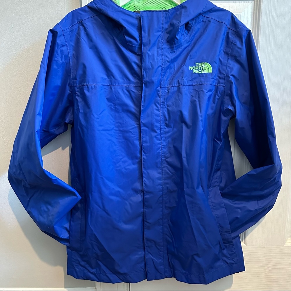 The North Face, size 14/16 boys wind breaker, color blue/lime green.